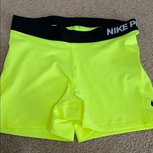 Neon yellow Nike Pro spandex